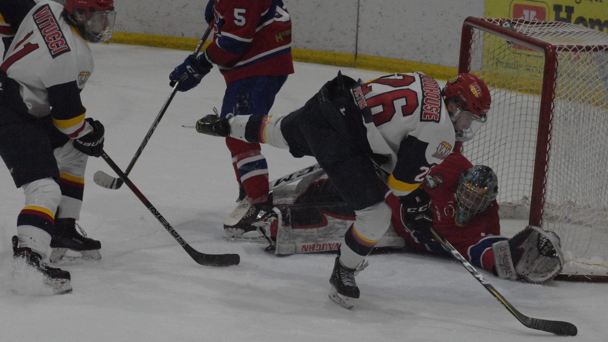 <p>ALL OUT- Wellington Duke Ben Woodhouse tries his best to test  Kingston net minder Alexei Masanko during the second period of Wellington&#8217;s 2-1 overtime win on Friday. (Jason Parks/Gazette Staff)</p>
