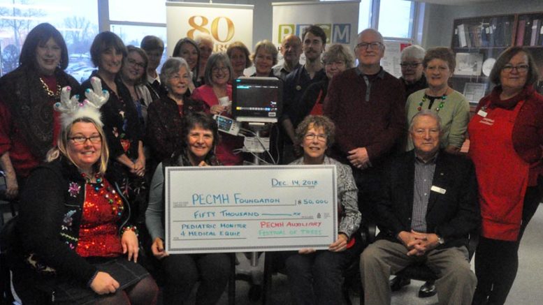 <p>Major gift  – The Prince Edward County Memorial Hospital Auxiliary presented the Prince Edward County Memorial Hospital Foundation $50,000 Friday following a successful Festival of Trees .The groups also witnessed a demonstration of a $22,668 pediatric monitor purchased from those funds. (Adam Bramburger/Gazette staff)</p>

