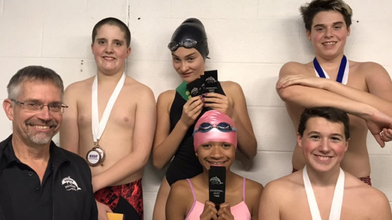 <p>Swimming success – The Quinte Dolphins’ Competitive 1 team had a productive meet in Belleville Nov. 23-25. Back row, from left, are McKinley Miller, Celia Reynolds, Jonah Barnes. Front row, from left are coach Jim Anfield, Kate Jones and Matthew Petracca. The Competitive 1 team members are the eldest swimmers in the club. (Submitted photo)</p>
