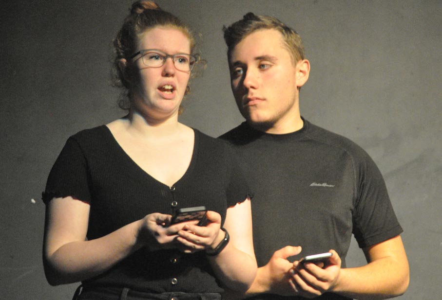 <p>Uncomfortable – Aaron Wiik’s character gets a little too close to Alanna Wolfe’s character during a portion of “Boys Will Be Boys” that was based on students’ actual experiences with unwanted attention. The students took part in the school’s eighth annual effort to raise awareness and encourage equality. (Adam Bramburger/Gazette staff)</p>
