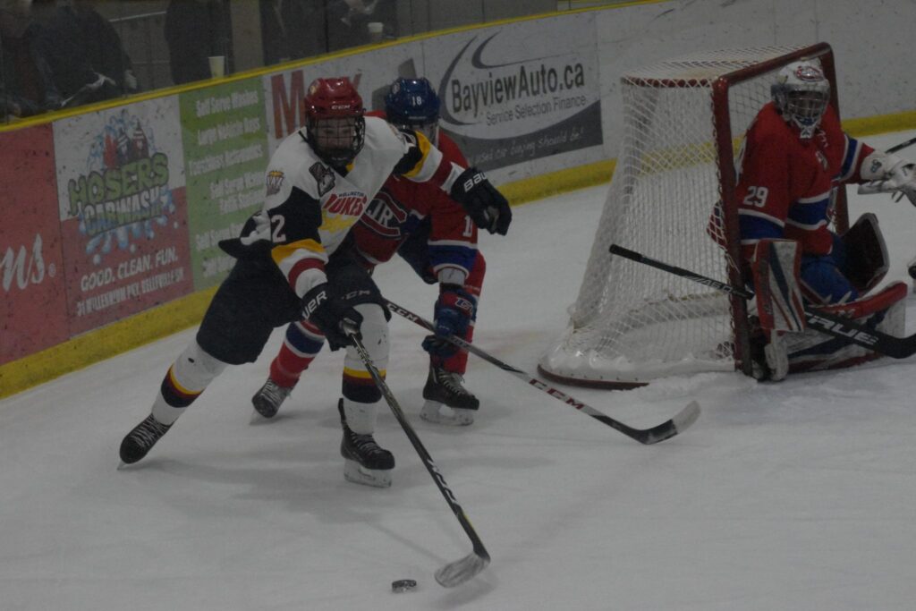 <p>OUT OF TOUCH- Wellington Dukes forward Daniel Panetta tries to regain control of the puck while being checked by Toronto Junior Canadien Cameron Fulop during the visitors 4-3 win at Lehigh Arena Friday night. (Jason Parks/Gazette Staff)</p>

