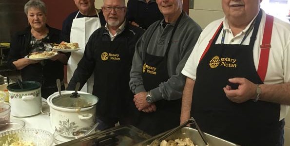 <p>Serving compassion From left: Ellen Snider, Rick Jones, Robert Quaiff, Grant Robinson, Doug Snider, and Bill Edwards serve the 20th annual Picton Salvation Army Loaves and Fishes Dinner. (Adam Bramburger/Gazette staff)</p>
