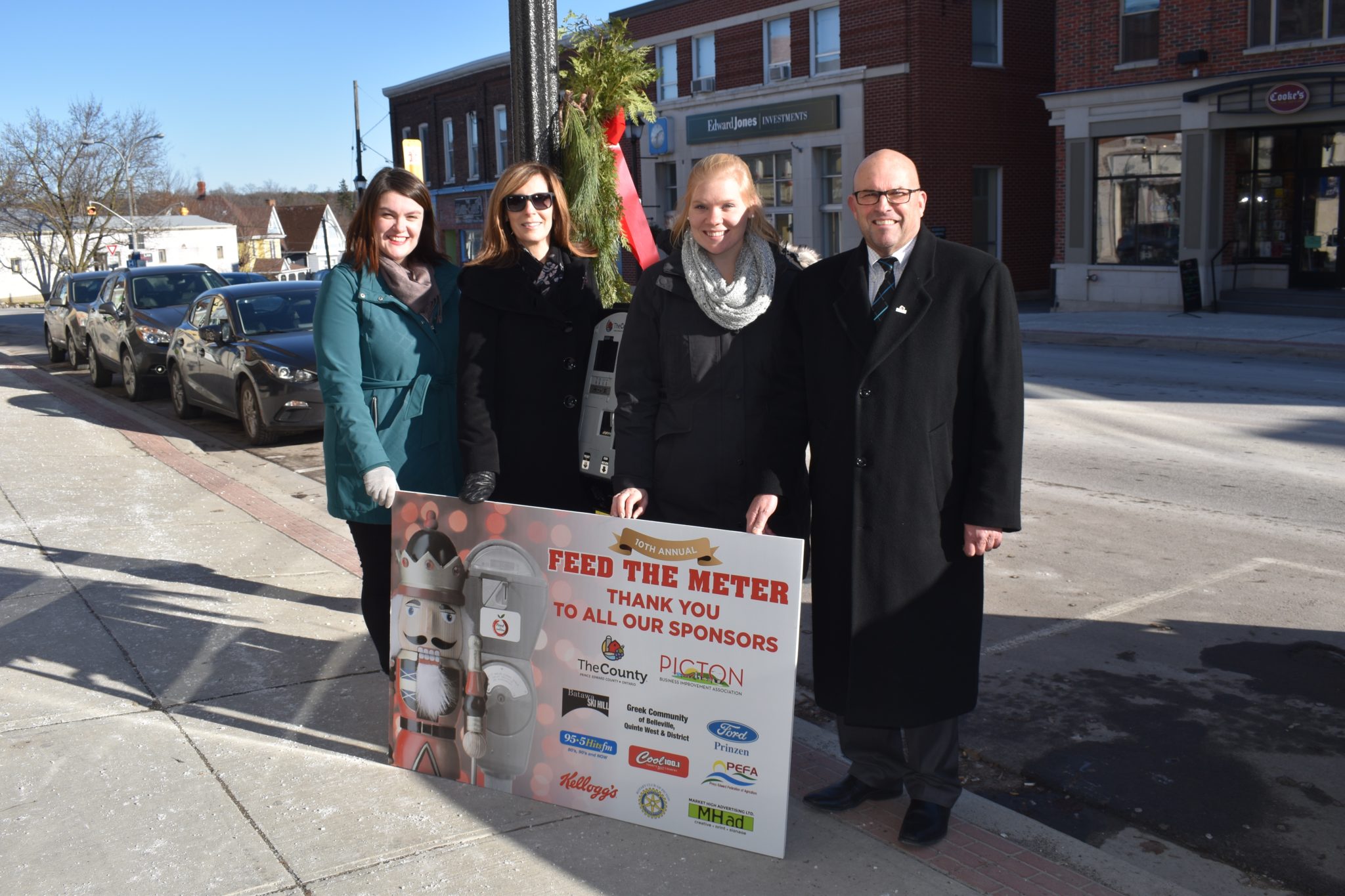 <p>TAKING A BITE OUT OF SCHOOL DAY HUNGER- (From left) Picton BIA Manager Sarah Doirion, Hastings and Prince Edward Learning Foundation Executive Director Maribeth deSnoo, Food for Learning Community Development Director Vicky Strutters and Prince Edward County Mayor Steve Ferguson announced the kick off for the annual Feed the Meter initiative in downtown Picton on Tuesday. (Jason Parks/Gazette Staff)</p>
