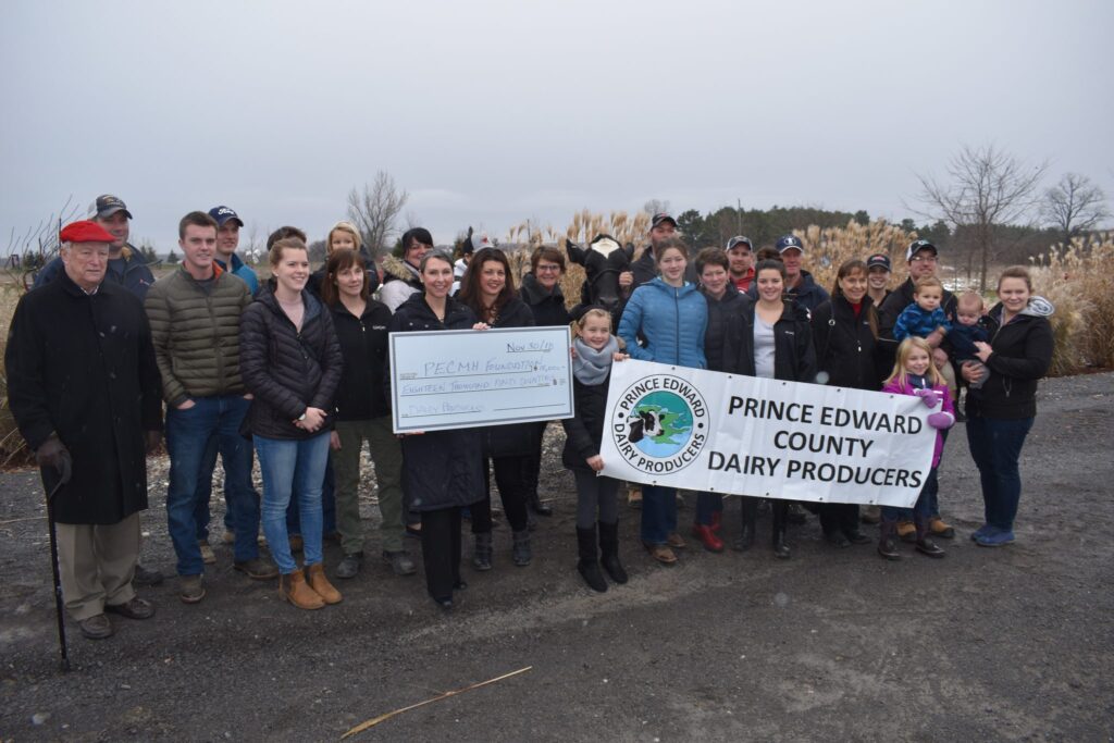 <p>MILKING SUPPORT- Prince Edward County dairy producers and Hospital Foundation members joined together on Friday to announced an $18,000 contribution by a group of local dairy farmers to the Back the Build campaign for the redevelopment of Prince Edward County Memorial Hospital. (Jason Parks/Gazette Staff)</p>
