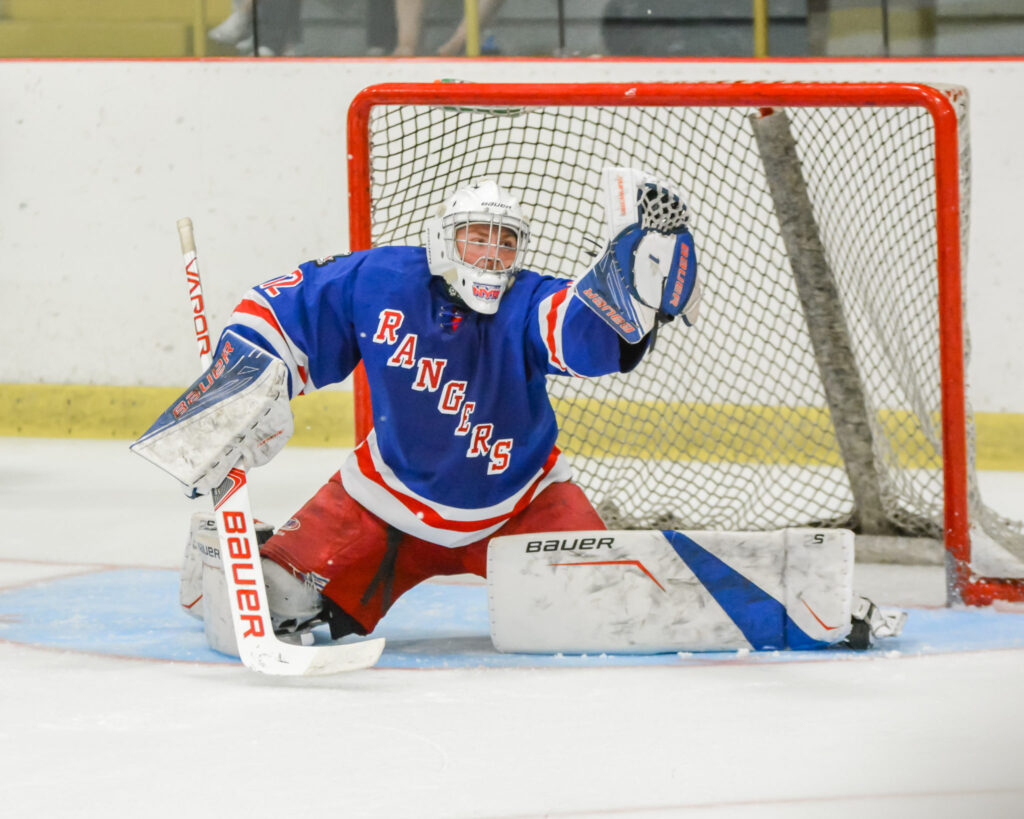 <p>FLYING HIGH- Jett Alexander of the North York Rangers makes a glove save earlier this season. The County native set the new OJHL regular season shutout record earlier this year.<br />
(Photo by Michelle Malvaso / OJHL Images)</p>
