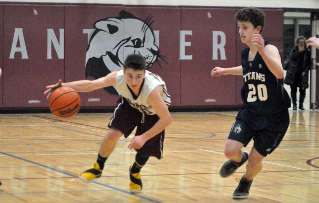 <p>On the run – PECI guard Ross Maycock attacks the sideline against St. Theresa Thursday evening. (Adam Bramburger/Gazette staff)</p>
