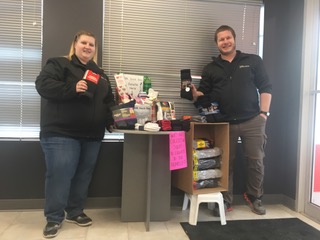 <p>Jacquelyn and Mike Kenthol, co-owners of The Source on Main Street, Picton collected almost 200 pairs of socks for a national initiative to help the homeless. (Submitted Photo)</p>
