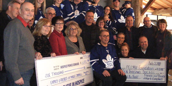 <p>Giving Grampy – Mark Campbell (seated in front) was joined by family, friends, local politicians and representatives of the Prince Edward County Memorial Hospital Foundation’s Back the Build campaign and Hospice Prince Edward at Karlo Estates Sunday. (Terry McNamee/For The  Gazette)</p>
