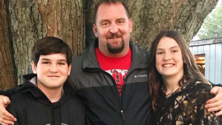 <p>(Centre) Shane Wilkinson with his son Jakob and his daughter Tally. (Submitted Photo)</p>
