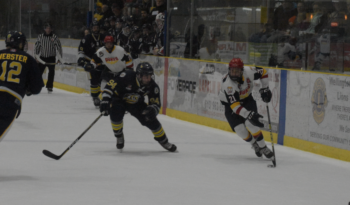 <p>EYES ON THE PRIZE- Wellington Duke Dawson Eills carries the puck into the offensive zone while eluding Shane Bull and Reid Webster of the Whitby Fury. Ellis scored the opening goal of Game 6, a 3-2 Wellington win that forces a Game 7 in the 2019 OJHL East Division finals in Whitby on Tuesday night. (Jason Parks/Gazette Staff)</p>
