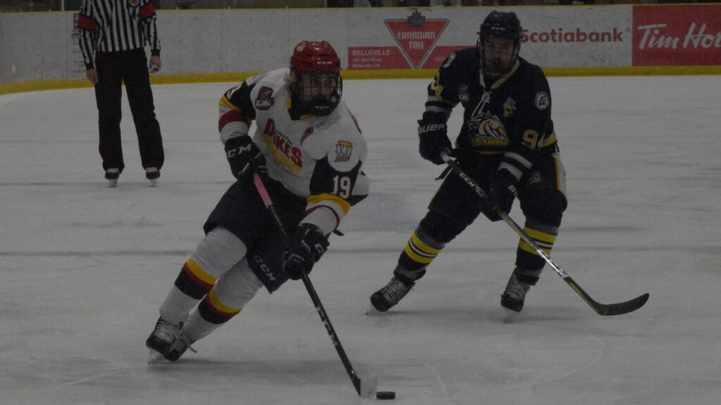 <p>Wellington Duke forward Tyson Gilmour skates away from Shane Bull of the Whitby Fury. The Fury took a 2-1 lead in the East Division finals Tuesday night by virtue of their 6-1 victory on home ice. (Jason Parks/Gazette Staff)</p>
