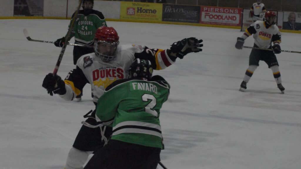 <p>Wellington Duke Dylan Massie tries to get around Nic Favaro during Game Two of the OJHL East Division Semi Finals at Lehigh Arena on Sunday. (Jason Parks/Gazette Staff)</p>
