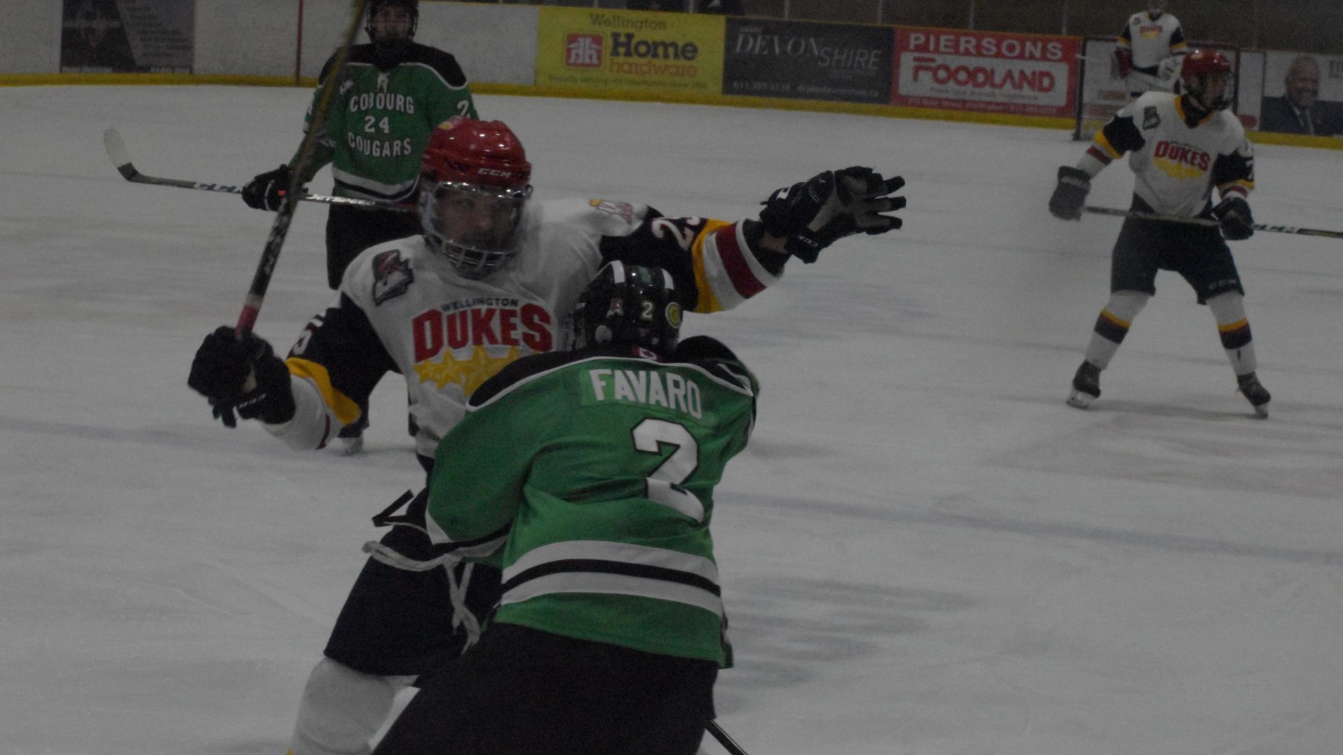 <p>Wellington Duke Dylan Massie tries to get around Nic Favaro during Game Two of the OJHL East Division Semi Finals at Lehigh Arena on Sunday. (Jason Parks/Gazette Staff)</p>
