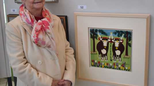 <p>THAT&#8217;S MAUDE &#8211; Gerry Russel, great niece of native Nova Scotian artist Maude Lewis was in attendance at the Bid the Build event Saturday. Russel is shown with Oxen in Spring. (Sarah Williams/Gazette Staff)</p>
