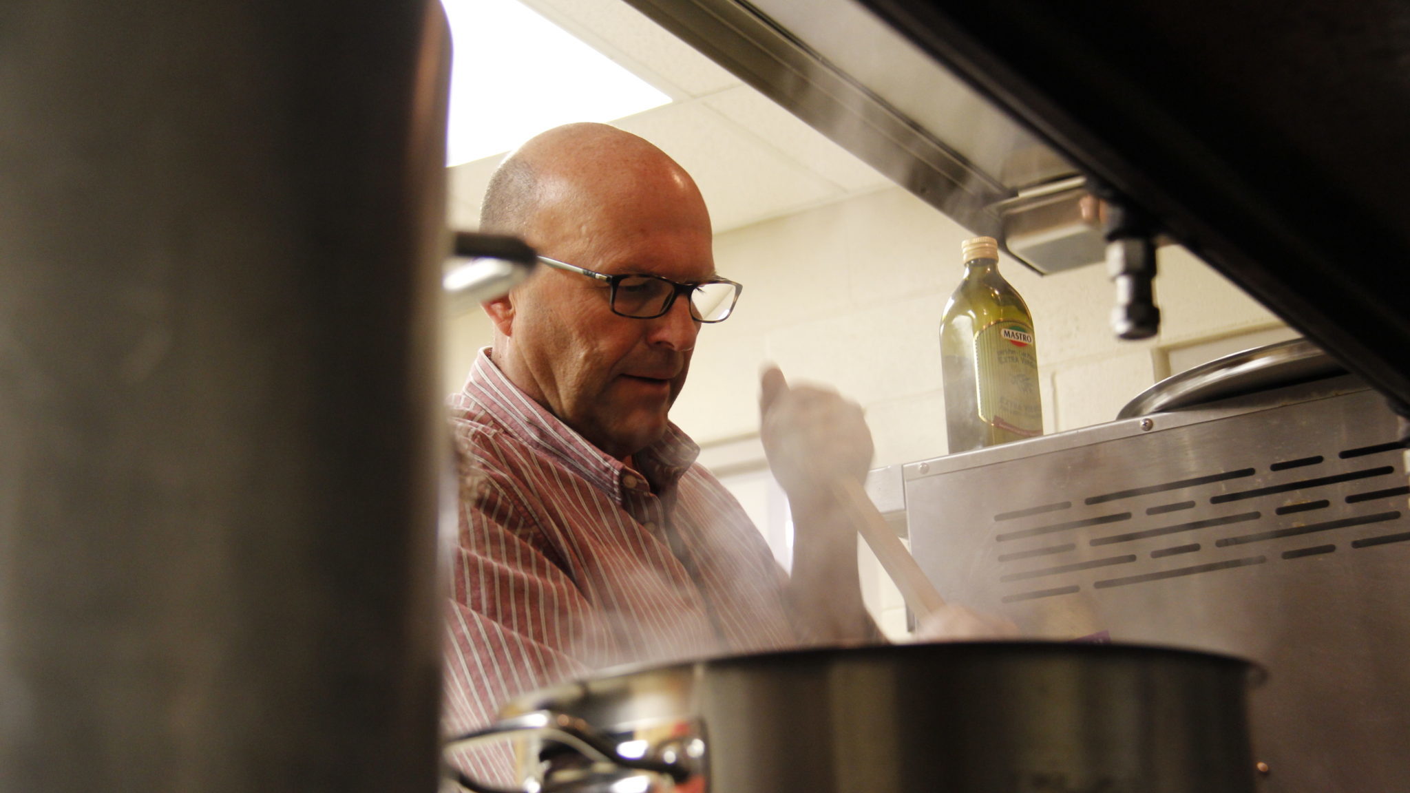 <p>INTO THE POT- Prince Edward County Mayor Steve Ferguson must have longed for the broiler that is the Shire Hall horseshoe while he boiled produce at Highline Hall on Wed. May 8. ((Desirée Decoste/Gazette Staff)</p>
