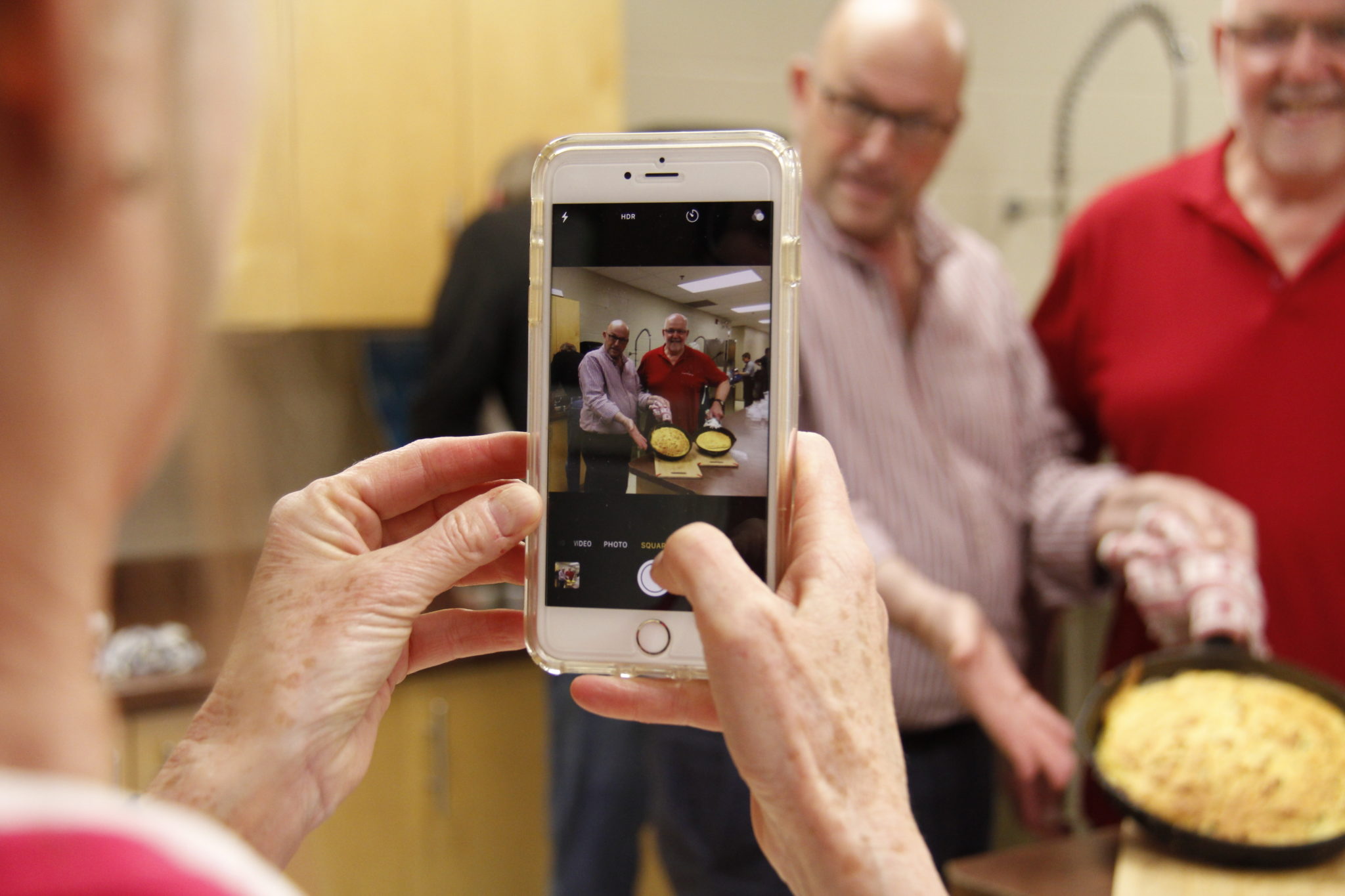 <p>Prince Edward County Mayor Steve Ferguson and Councillor John Hirsch show off their creation at the Food to Share weekly cooking event in May. (Desirée Decoste/Gazette Staff)</p>
