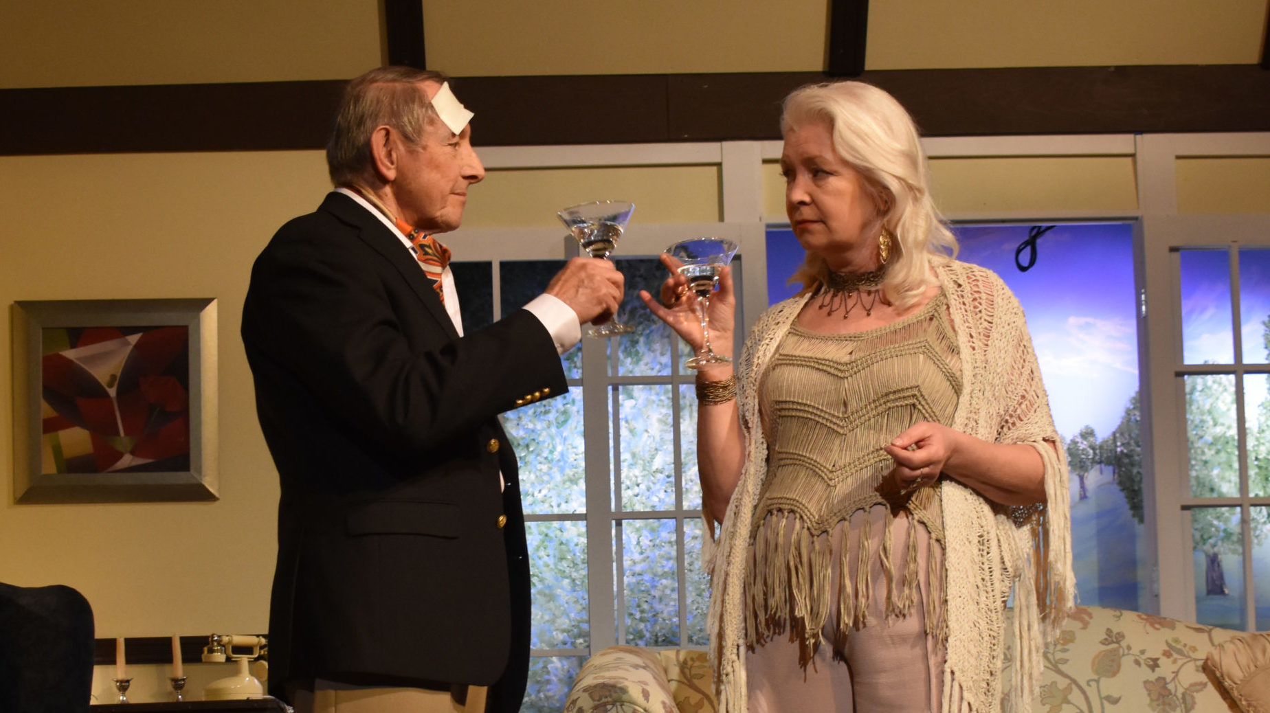 <p>ALL IN A DAYS LAUGH- Edward Bennett (Barrie Atkinson) and Sorel Bennett (Penny Kitchen) toast to something devious during a dress rehearsal of Death by Design: A Comedy with Song and Murder at Mount Tabor Playhouse. (Sarah Williams/Gazette File Photo)</p>
