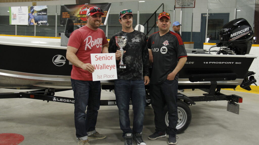 <p>THE WALLEYE WINNER- Fishing buddies (Left) Rob Colangeli and (Right) Karl Okomski join   2019 Walleye World winner (Centre) Mark Fiume at the awards presentation in Trenton on Sunday afternoon. (Desirée Decoste/Gazette Staff)</p>
