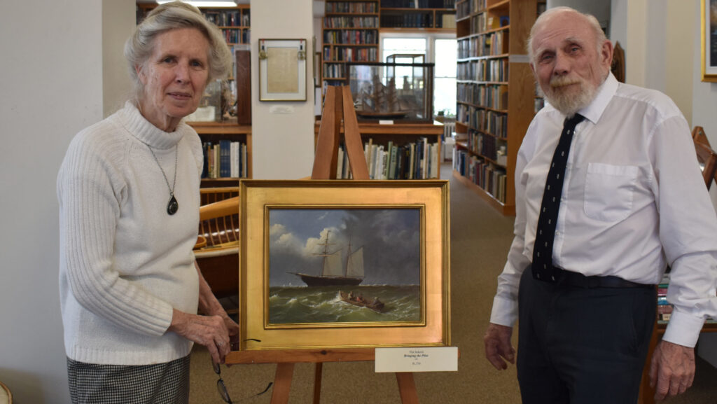 <p>SAILING AWAY- Dr. Paul Adamthwaite and Betty Anne Anderson of the Victory, home of the Canadian Society of Marine Artists and Naval Marine Archives, opened their 36th annual naval art exhibition on Friday. Among the featured works include ‘Bringing the Pilot’ by Pim Sekeris.(Sarah Williams/Gazette Staff)</p>
