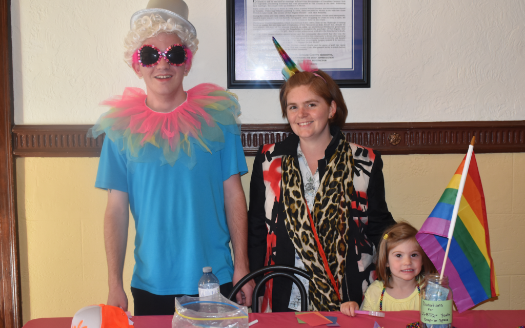 <p>CELEBRATING IN STYLE – (L-R) Skylar Gray, co-organizer of the new LGBTQ youth drop-in space, along with Joanna Howard of the Picton Public Library and her daughter, Claire. (Sarah Williams/Gazette Staff)</p>
