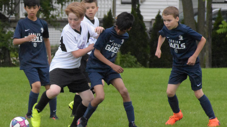 <p>TAKE OFF (In white) Alex Pickle and Hayden Bender of the Quinte Ortho U12 Eagles try to move the ball into scoring position against the Kingston Clippers in SOSA action in Picton Thursday.  (Jason Parks/Gazette Staff)</p>
