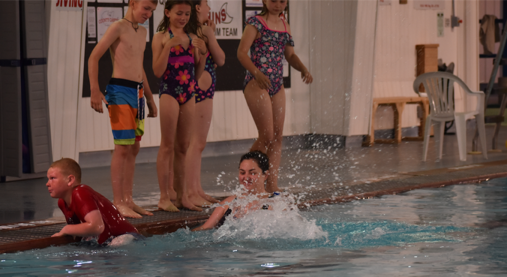 <p>THE SOPHIASBURGH SPLASH- Students from Sophaisburgh Central School take the plunge at PEFAC Thursday. The Grade 3 Students are part of the graduating group of local elementary students taking part in PEFAC’s Swim to Survive program. (Sarah Williams/Gazette Staff)</p>
