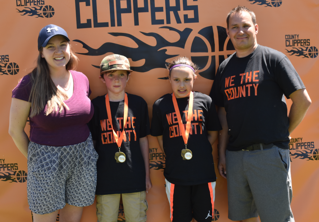 <p>Members of the U10 coaching staff (Left) Kurstyn Brant and (right) (Right) Jamie McCourt with Most Improved Player Theo Wollenberg and Most Valuable Player Victoria McCourt. (Jason Parks/Gazette Staff)</p>

