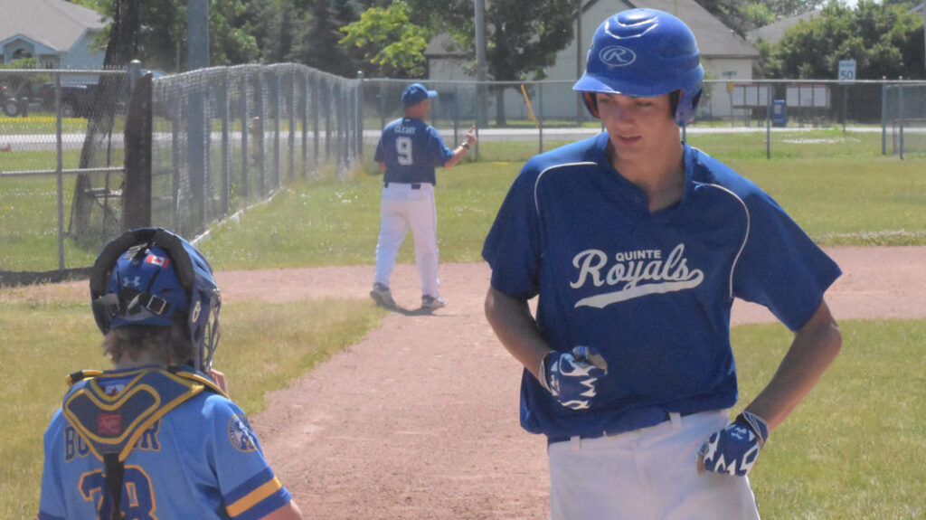 <p>COMING HOME Quinte Midget Royals starting pitcher Will Ronan comes across home plate in the second inning of his team’s 10-1 win over visiting Oshawa at Wellington’s Field of Dreams Sunday.  (Jason Parks/Gazette Staff)</p>
