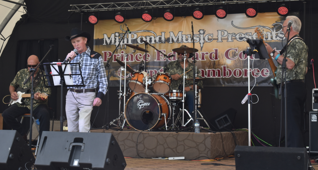 <p>SUMMER SONGS – Harry McCaugherty of Napanee sings old style country songs in the heat of the day Saturday at the 5th Annual Country Music Jamboree. (Sarah Williams/Gazette Staff)</p>
