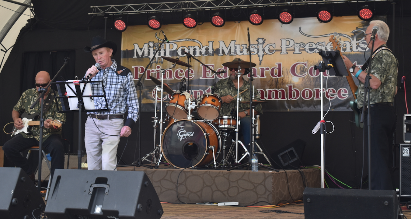 <p>SUMMER SONGS – Harry McCaugherty of Napanee sings old style country songs in the heat of the day Saturday at the 5th Annual Country Music Jamboree. (Sarah Williams/Gazette Staff)</p>
