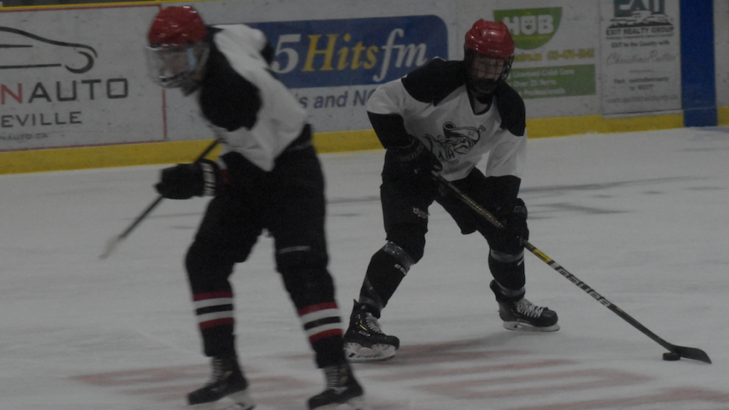 <p>TOUCH SCREEN- (Left) Picton Pirate Nolan Dawson head to the net to help create a screen for fellow Picton native Ian Harrison during the Picton Pirates training camp at Lehigh Arena Monday evening. (Jason Parks/Gazette Staff)</p>
