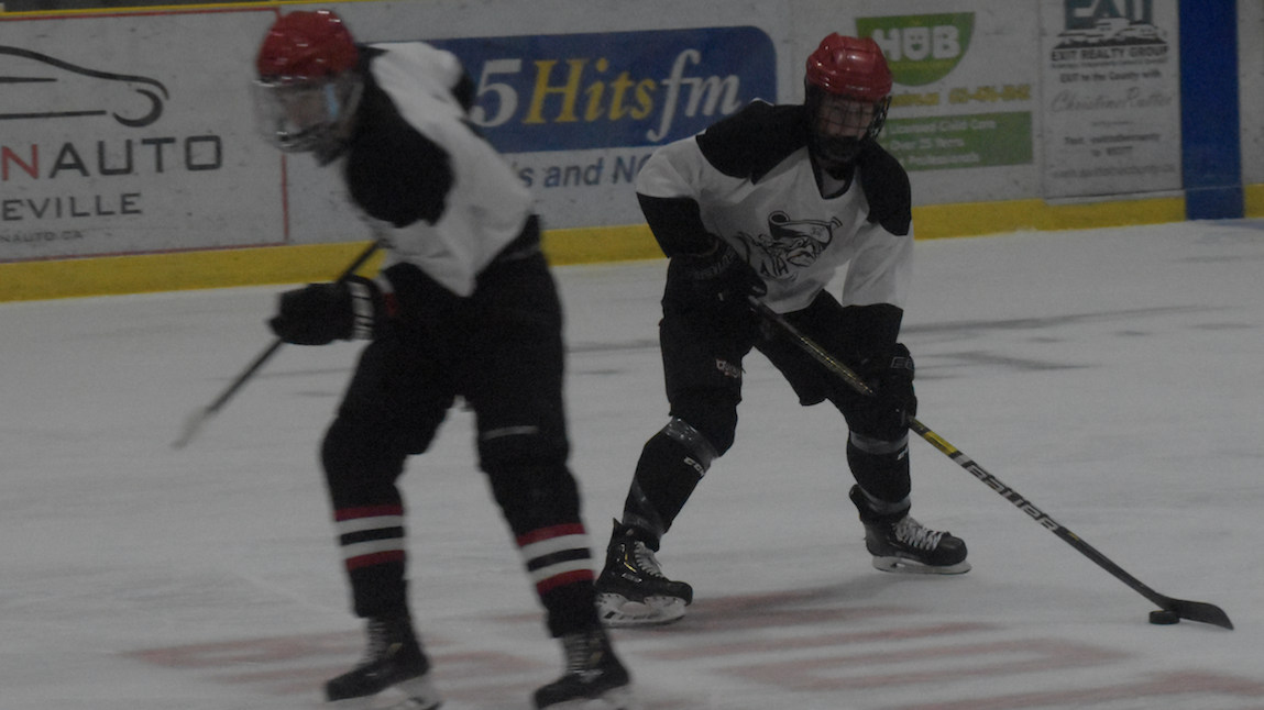 <p>TOUCH SCREEN- (Left) Picton Pirate Nolan Dawson head to the net to help create a screen for fellow Picton native Ian Harrison during the Picton Pirates training camp at Lehigh Arena Monday evening. (Jason Parks/Gazette Staff)</p>

