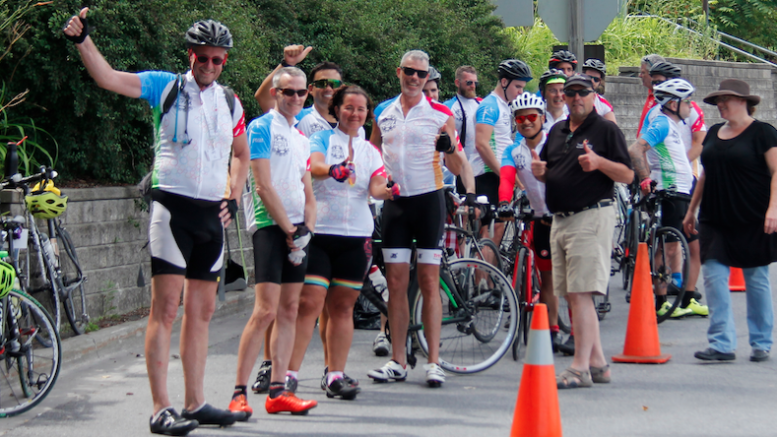 <p>MAKING FRIENDS Cyclists participating on the 20th annual Friends for Life Bike Rally meet with Mayor Steve Ferguson. Ferguson and members of council handed out water to participants. (Desirée Decoste/Gazette Staff)</p>
