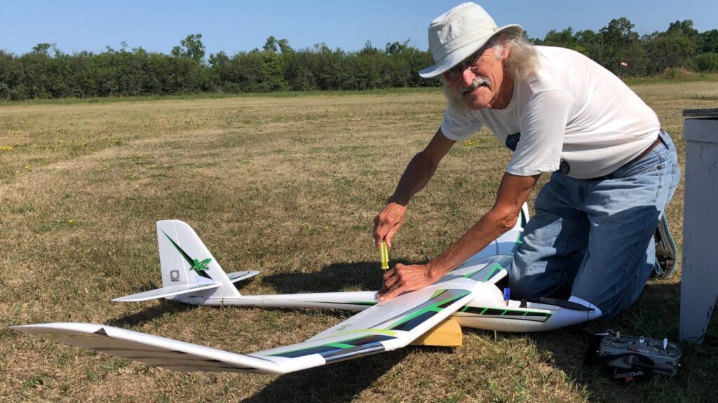 <p>HIGH FLYING- Bay of Quinte Aeromodeller club member Micheal McMahon carefully tunes his flying glider before taking off at the club’s Fun Fly at Bob Corner Airfield on Stinson Block Rd. Saturday. (Jason Parks/Gazette Staff)</p>
