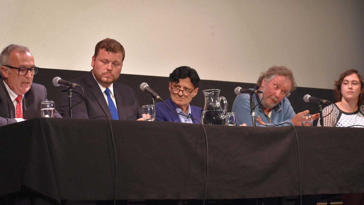 <p>UP FOR A DEBATE- Incumbent Bay of Quinte MP Neil Ellis makes a point while challengers Tim Durkin, Paul Bordonaro, Danny Celovsky and Stephanie Bell listen on at the Prince Edward County Chamber of Commerce/Prince Edward Federation of Agriculture sponsored candidates debate at the Regent Theatre Wednesday. (Sarah Williams/Gazette Staff)</p>
