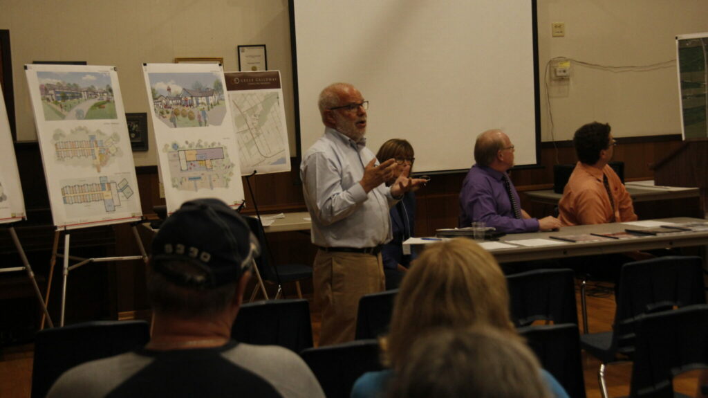 <p>READY FOR REDTAIL EAST- Treat Hull, the project Manager of Redtail East, spoke to a crowd of about 50 people at Hillier Town Hall Wednesday evening and announced the start of a planning application that could see a nordic spa and resort built on Loyalist Parkway just south of Consecon. (Desirée Decoste/Gazette Staff)</p>
