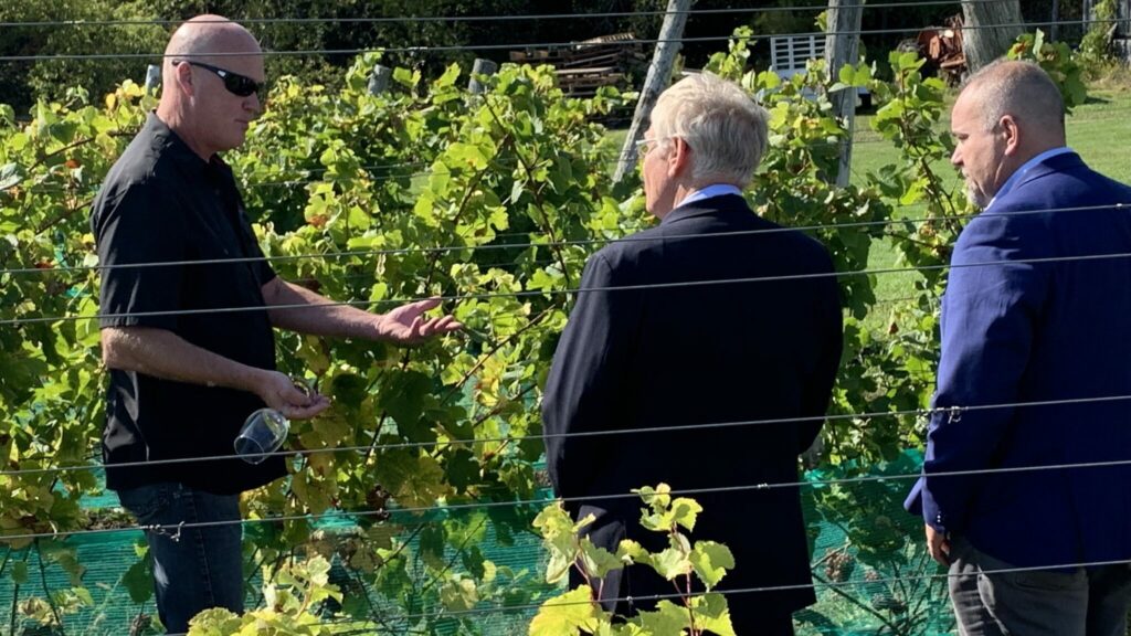 <p>A GROWING CONCERN- Three Dog Winery owner John Squair speaks with Ministry of Agriculture, Food and Rural Affairs Ernie Hardeman and Bay of Quinte MPP Todd Smith at the Sophiasburgh winery on Friday afternoon. Hardeman was in Prince Edward County to announce the province would be committing to $15 million of transition funding for Ontario’s beverage sector. (Submitted Photo)</p>
