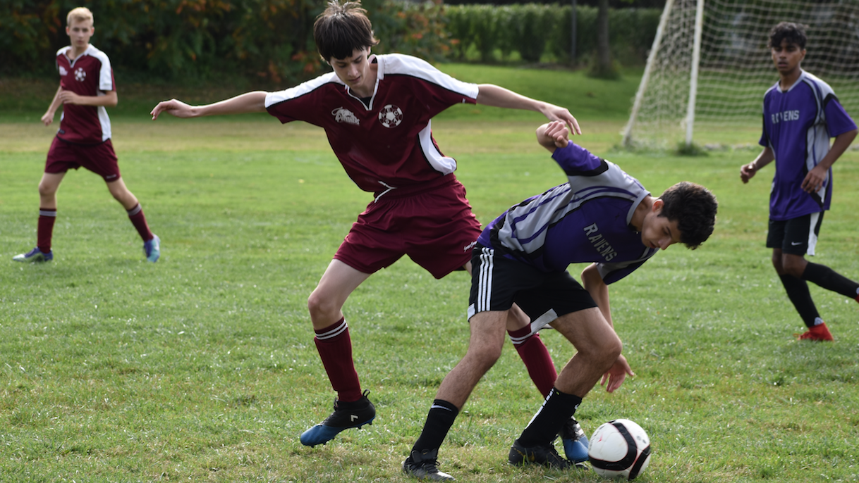 <p>ON THE PROWL-Senior Panther Ben Hicks tries to get around an East Side Secondary School defender during PECI&#8217;s 3-1 win at home on Tuesday. (Jason Parks/Gazette Staff)</p>
