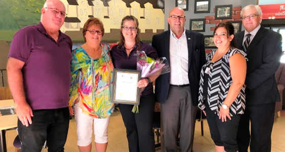 <p>SCHOLARSHIP WINNER Garry Lynch and Joy Vervoort (far left), Jean Lynch’s children, present Janine Caldwell (middle) with the scholarship. They are joined by Mayor Steve Ferguson, Natasha Williams, Acting Administrator at H.J. McFarland Memorial Home, and Robert McAuley, Acting CAO for the County of Prince Edward.(Submitted photo)</p>
