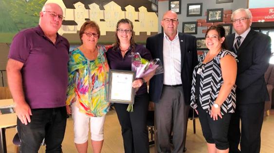 <p>SCHOLARSHIP WINNER Garry Lynch and Joy Vervoort (far left), Jean Lynch’s children, present Janine Caldwell (middle) with the scholarship. They are joined by Mayor Steve Ferguson, Natasha Williams, Acting Administrator at H.J. McFarland Memorial Home, and Robert McAuley, Acting CAO for the County of Prince Edward.(Submitted photo)</p>
