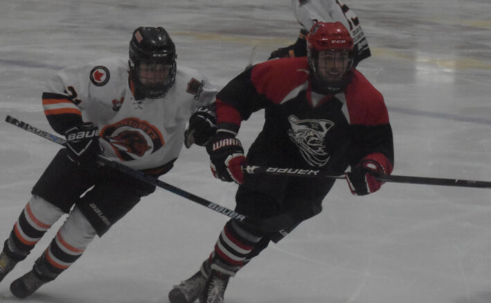 <p>CLOSE QUARTERS- North Kawartha’s Matthew Willbee tires to track down Picton’ s Derrick Vos during the Knights 6-3 win over the Pirates at Lehigh Arena on Sunday.  (Jason Parks/Gazette Staff)</p>
