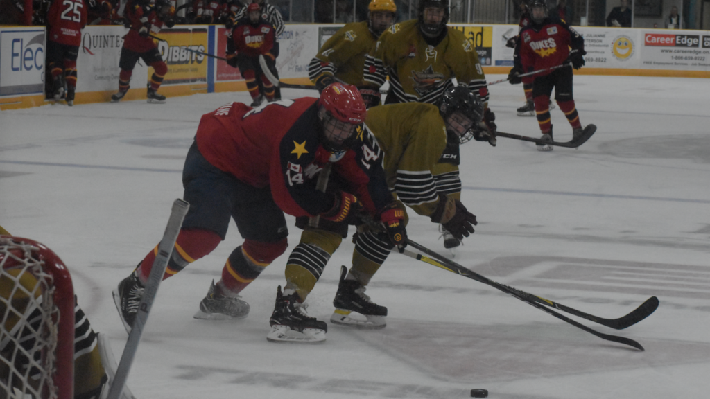 <p>EVADING CAPUTRE- Wellington Dukes forward Ben Evans slips past Trenton Golden Hawks defender Noah Prudhomme during Trenton’s 4-0 win over the visiting Dukes Friday night at the Duncan MacDonalds Memorial Arena. (Jason Parks/Gazette Staff)</p>
