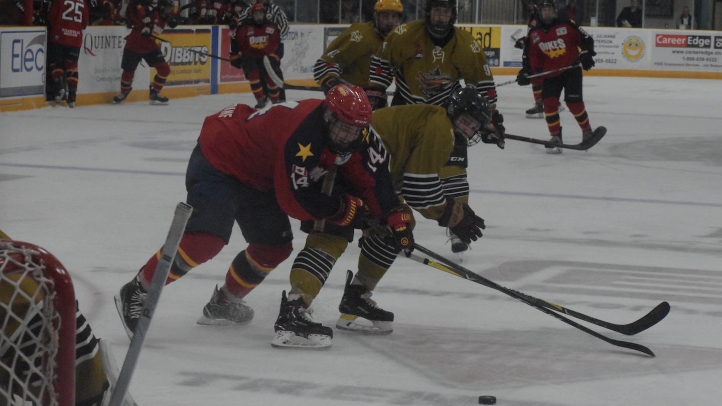 <p>EVADING CAPUTRE- Wellington Dukes forward Ben Evans slips past Trenton Golden Hawks defender Noah Prudhomme during Trenton&#8217;s 4-0 win over the visiting Dukes Friday night at the Duncan MacDonalds Memorial Arena. (Jason Parks/Gazette Staff)</p>

