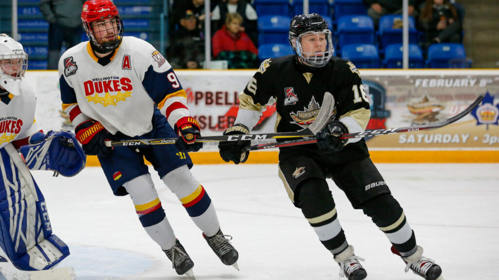 <p>STAYING IN FRONT- Dukes defenceman Brett  Humberstone stays ahead of Jared Gerger of Trenton Golden Hawks during Wellington’s 4-0 win in Quinte West Friday night.<br />
(Amy Deroche/ OJHL Images)</p>
