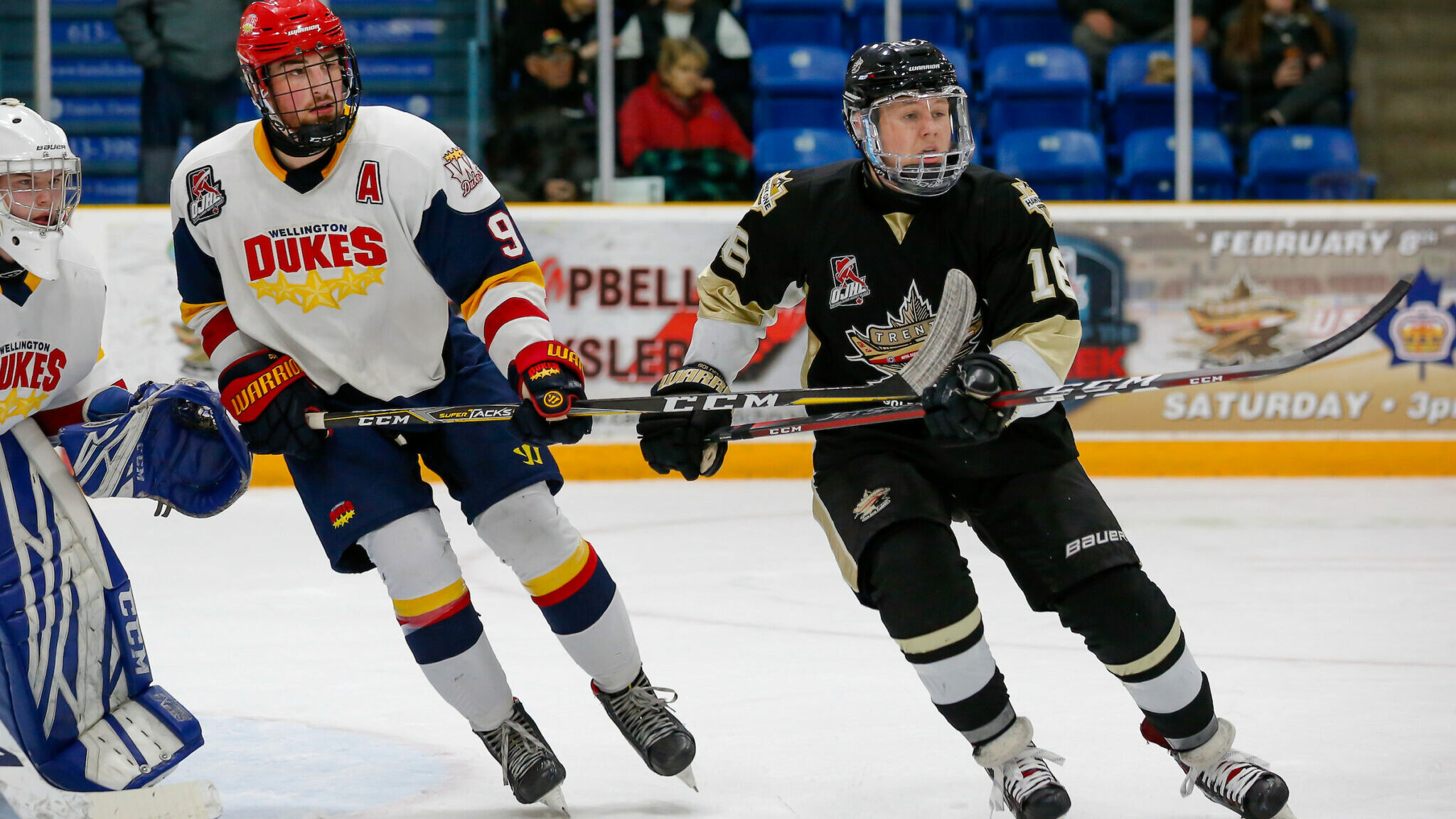 <p>STAYING IN FRONT- Dukes defenceman Brett  Humberstone stays ahead of Jared Gerger of Trenton Golden Hawks during Wellington’s 4-0 win in Quinte West Friday night.<br />
(Amy Deroche/ OJHL Images)</p>

