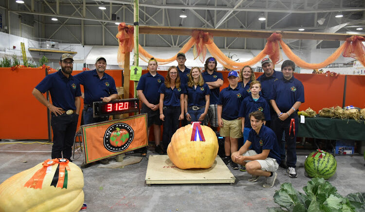 <p>ORANGE GIANT The 4-H Giant Vegetable Club seen at the 2019 Picton Fair with their efforts which included a 688 lbs pumpkin.  (submitted photo)</p>
