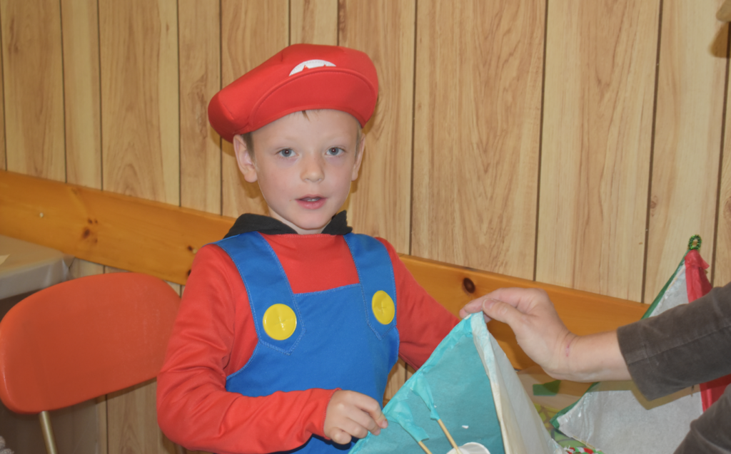 <p>HAVING A SUPER TIME- Austin works away at a creation at the Firelight Lantern Festival Workshop at Consecon’s Masonic Temple on Saturday. The event was part of the village’s annual Haunting in the Hamlet. (Sarah Williams/Gazette Staff)</p>
