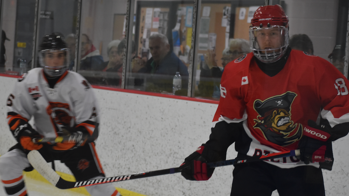 <p>(Right) Picton Pirate Tristan Cowan had an assist in a 4-2 loss to the visiting North Kawartha Knights on Saturday night. (Jason Parks/Gazette Staff)</p>
