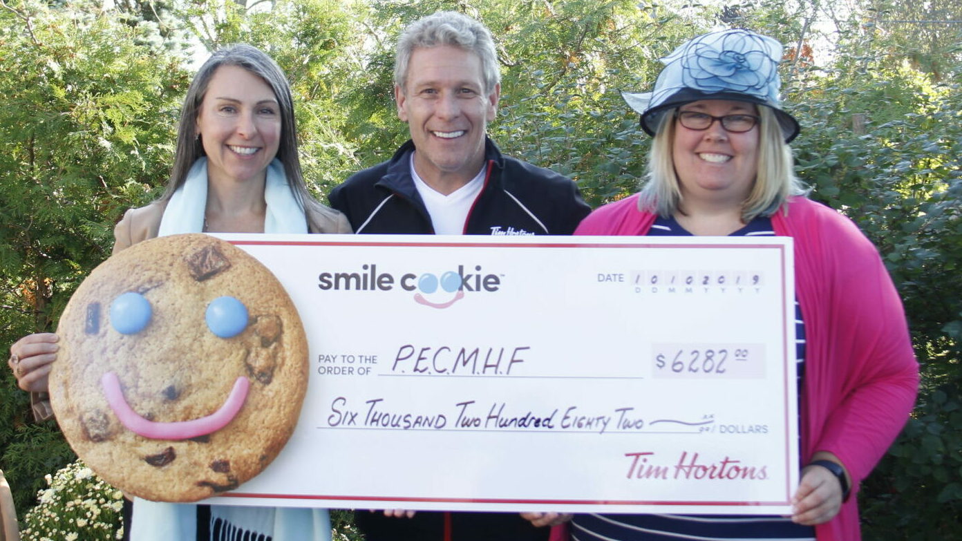 <p>FROM EAR TO EAR- Thursday at PECMH was nothing but smiles as the PECMHF accepted a significant cheque from the Tim Hortons Smile Cookie Campaign. Pictured here from left to right, Shannon Coull, executive director of the PECMH Foundation, Paul Massey, owner of the Picton and Wellington Tim Hortons restaurants and Briar Boyce, senior development officer with the PECMH Foundation. (Desirée Decoste/Gazette Staff)</p>
