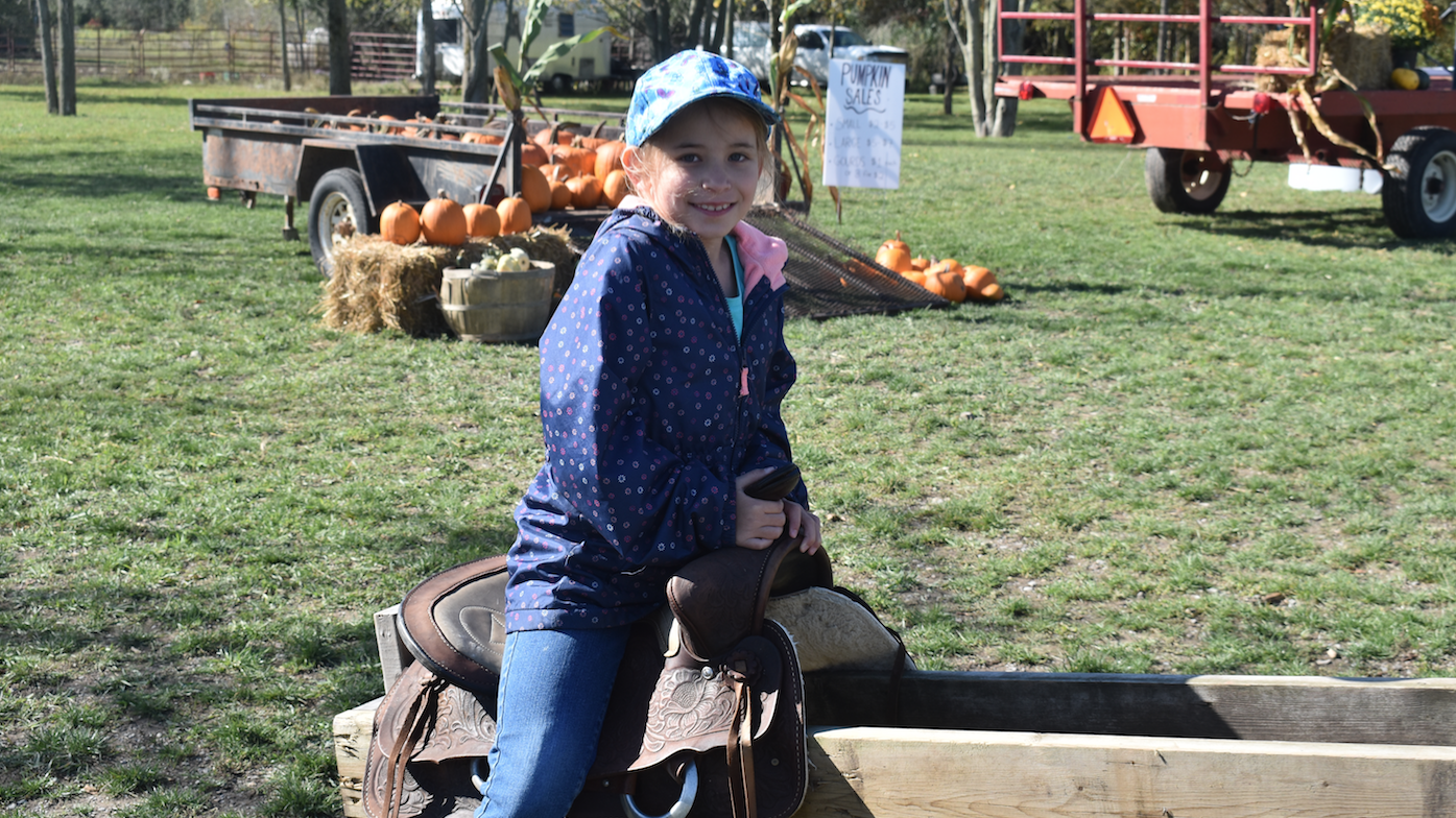 <p>Grace was one of the many children enjoying the festivities at the Heal With Horses Farm Fun Day event on Saturday. (Sarah Williams/Gazette Staff)</p>
